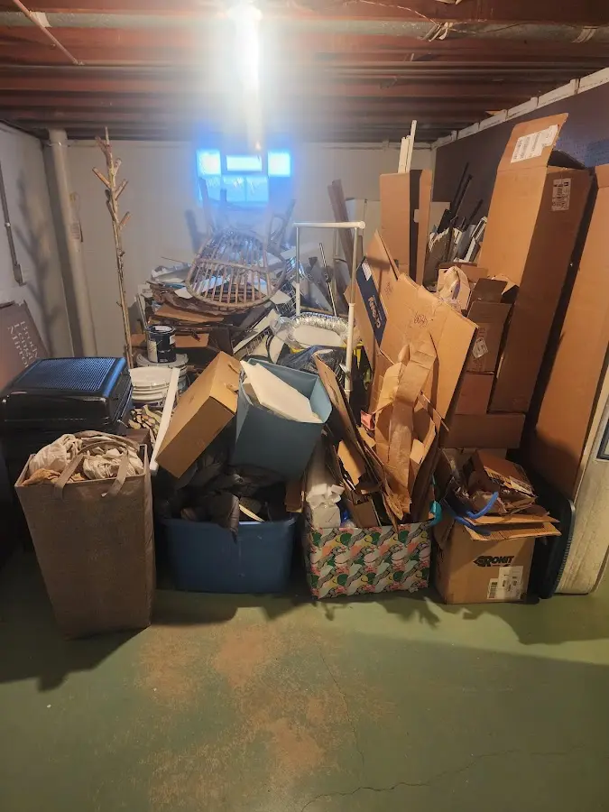 Roll-off dumpster container at job site for 4 Yard Dumpster Rental in Wheatfield